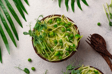 Zucchini pasta with green peas