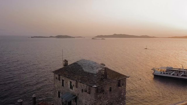 Aerial View of the Historical Prosforio Tower During Sunset Time.