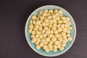 sweet puffed corn balls with coconut in a bowl