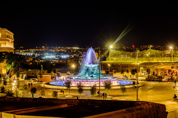 Fototapeta na wymiar Triton Fountain at night