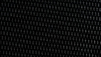 Black pimpled background from wicker fabric texture