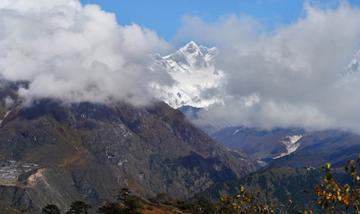 Lhotse  8516m mountain - is 4th higest peak in the world covered with clouds. Hotel Everest View point. Everest Base Camp trekking route near Namche Bazaar, Nepal. 