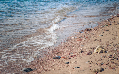 sand stone coast sea water waves waterfront scenery landscape background photography 