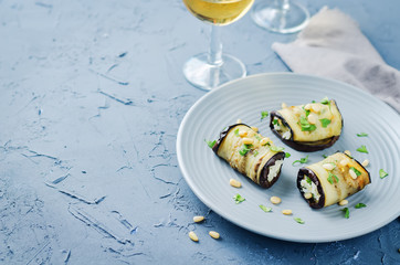 Rice pine nuts cilantro goat cheese stuffed eggplant rolls