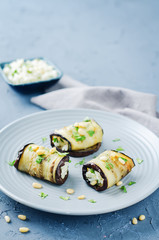 Rice pine nuts cilantro goat cheese stuffed eggplant rolls