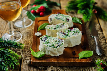 Turkey spinach ricotta dried cranberry roll ups