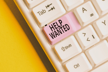 Text sign showing Help Wanted. Business photo showcasing An ad in the paper an employer places to...