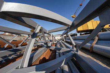 The section of metal structures ready for shipment lies on the production base
