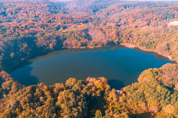 Beautiful mountain lake in autumn. Aerial view. Nature landscape. View of the colorful autumn...