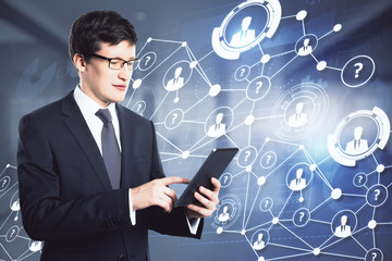 businessman using tablet with digital interface