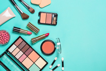 Makeup professional cosmetics on mint background.