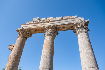 With blue sky,Marble columns of Temple of Tyche, goddess of fortune, Roman, late first century AD, Olba, (Uzuncaburc), Silifke, Mersin,Turkey