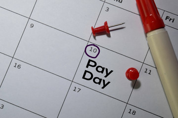 Pay Day write on calendar. Date 10. Reminder or Schedule Concepts