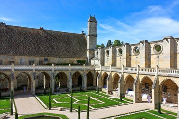Royaumont Cistercian Abbey cloister in sunny day. Ile-de-France region, France.