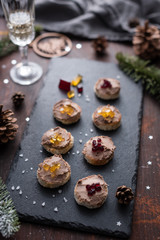Fototapeta na wymiar Christmas Pate Canapes with Cranberry and Apple Jelly