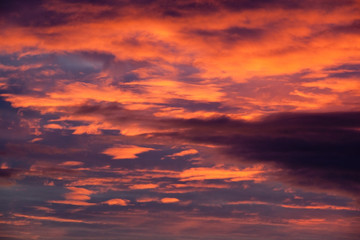 Naklejka na ściany i meble Colorful twilight red and black dramatic sunset sky