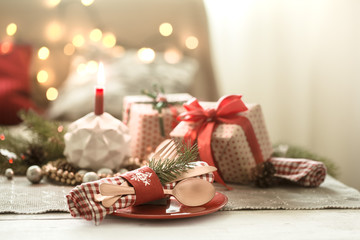 Beautifully decorated Christmas table in the living room.