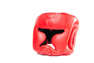 Boxing helmet isolated on white. The concept of sport and active leisure. On the table lies a helmet for boxing, kickboxing. Playing sports, taking care of your figure, fight and self-defense.