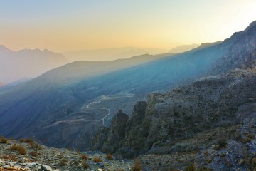 Naklejka na ściany i meble Scenic Hajar Mountains view with stunning Light