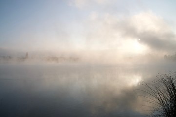 Obraz na płótnie Canvas foggy lake