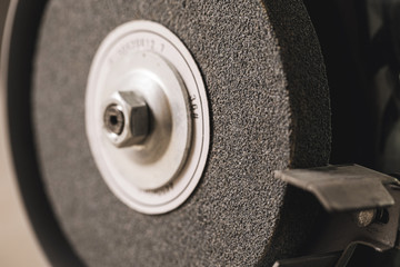 Close-up of bench grinder machine