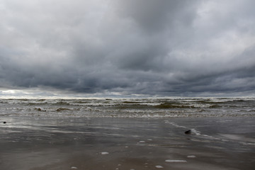 dramatic stormy clouds on the beach