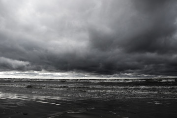 dramatic stormy clouds on the beach