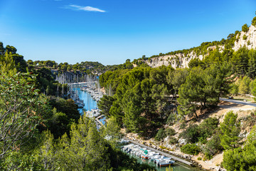 Fototapeta premium White sailing yacht in the sea fjord. National park of Calanques in Provence.