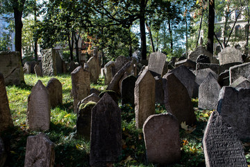 Old Weathered Tombstones On Jewish Cemetery In Prague In The Czech Republic