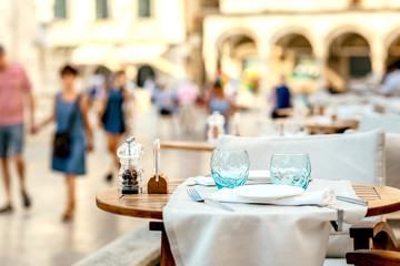 Glasses table setting in a summer restaurant