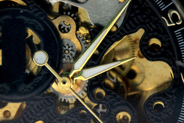 Mechanical skeleton watch on a white background