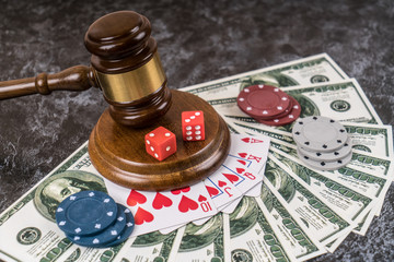 Gavel judge and gambling for money, casino. Poker cards, chips, dice. Forbidden games, underground