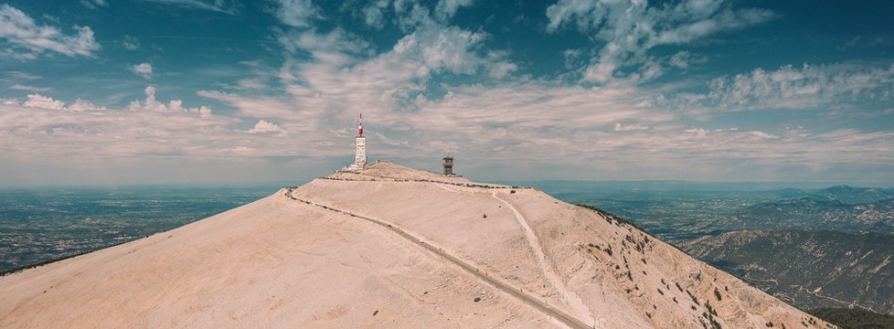 Panoramic shot of a building on a hill under the cloudy sky in Mont ventoux, France