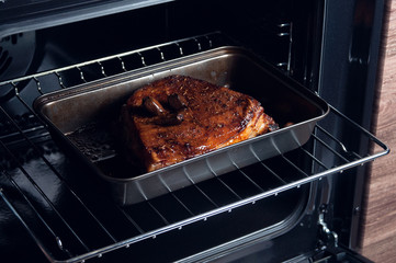 Grilled pork ribs in the oven. Meat from the oven.