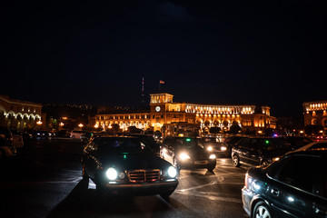 Fototapeta na wymiar Yerevan at night. The Government of the Republic of Armenia and Central Post Office on Republic Square, the most important square of the capital Yerevan, Armenia.