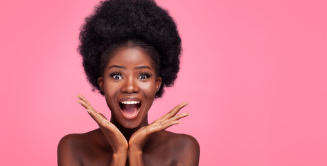 African Woman and Smiles Widely. Beauty Concept. - obrazy, fototapety, plakaty