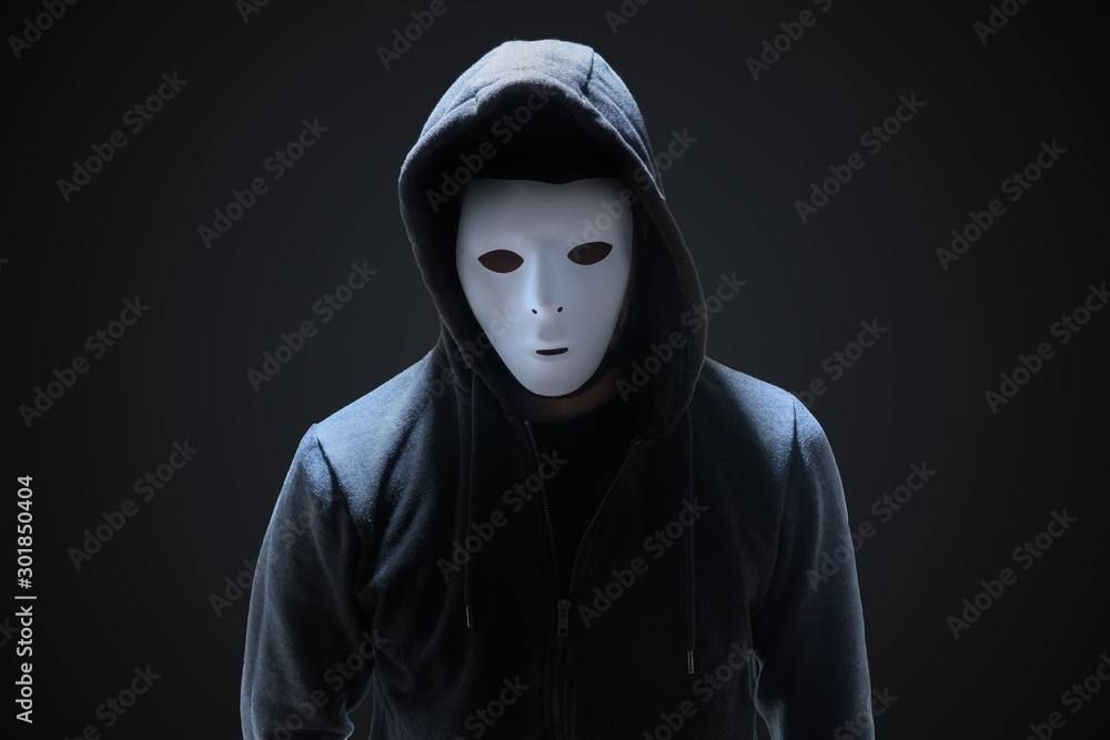 Poster masked anonymous hacker on black background.