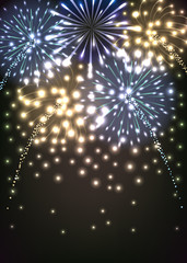 Colorful fireworks on dark blue sky. New year background
