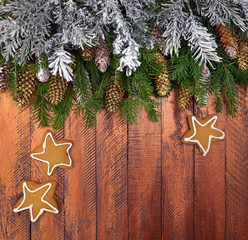 Festive winter background with a snowy Christmas tree and cones. Christmas mood. Top view. Flat lay