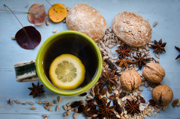 Fototapeta na wymiar Autumn decorations. Star anise, tea and dried fruit