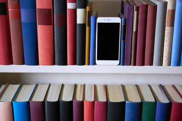Accurate bookcase with mobile phone