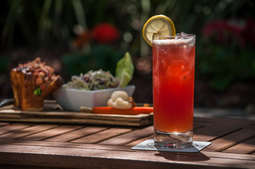 Red cocktail with lunch