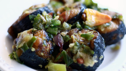 Fried Asian swamp eel with chili sauce or belut cabai hijau.