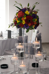 flowers in a vase on wedding table