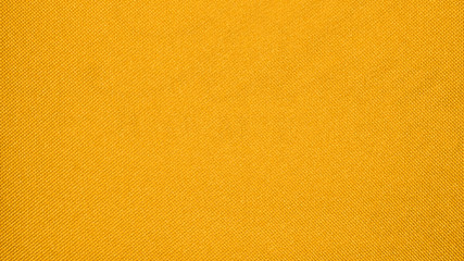 Yellow texture of binding fabric.Yellow fabric background.Yellow fabric. Background with a textured...