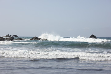 Surf on the rocky shore of the Atlantic Ocean