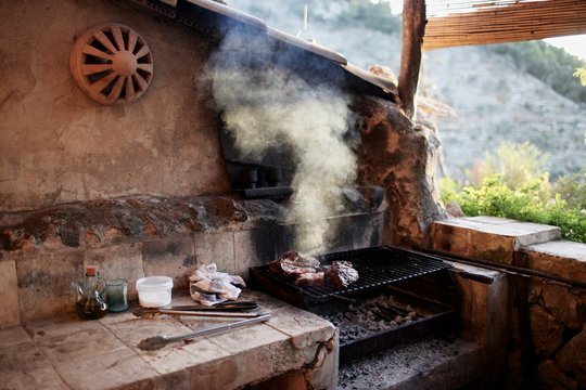 grilling meat outside
