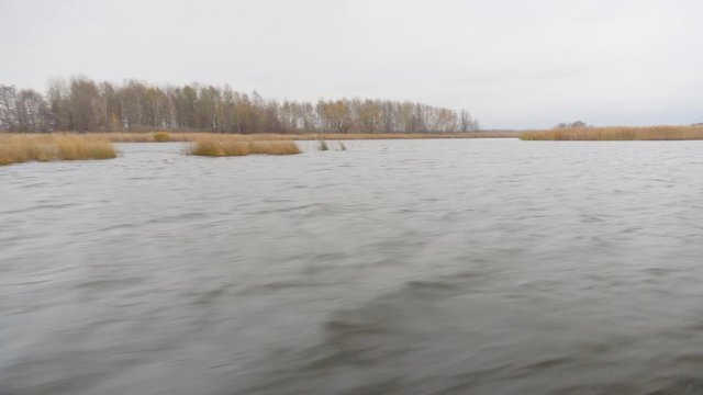 Autumn river, nature, view from the boat. Fishing.