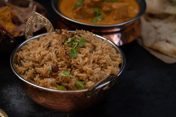 Indian tamarind rice in copper bowl