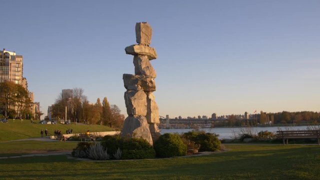 inukshuck with burrard bridge in the background
